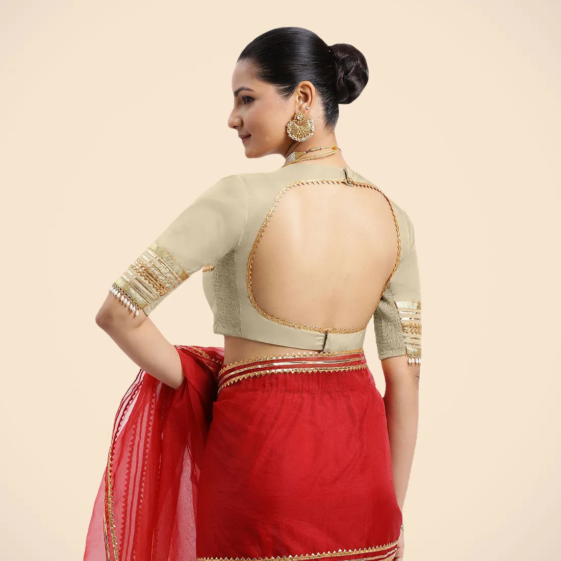 Farheen x Tyohaar | Cream Embellished Elbow Sleeves FlexiFit™ Saree Blouse with Zero Neck with Back Cut-Out and Golden Gota Embellishment