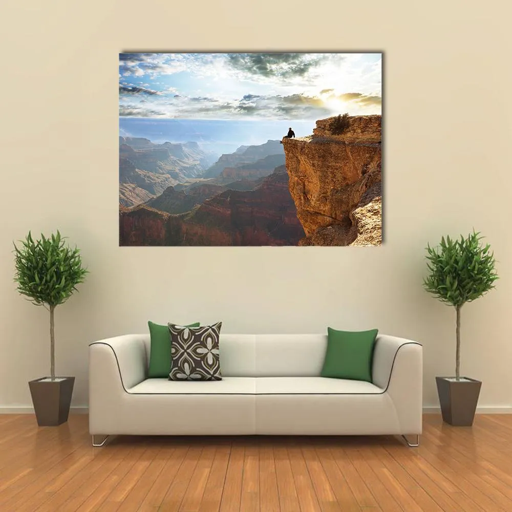 Man Sitting On Grand Canyon Canvas Wall Art