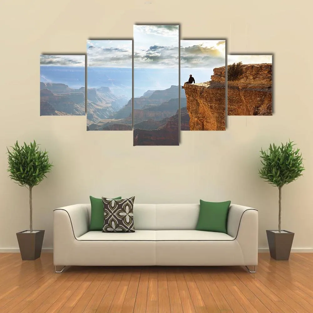 Man Sitting On Grand Canyon Canvas Wall Art