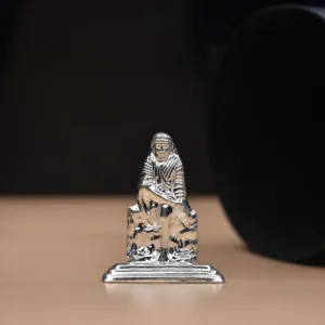 Sacred Brilliance: Handcrafted Pure Silver Sai Baba Idol for Divine Blessings"